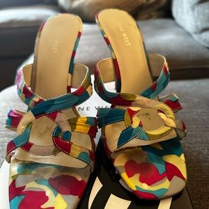 Size 9 multicolor nine W. heel very comfortable worn a few times.